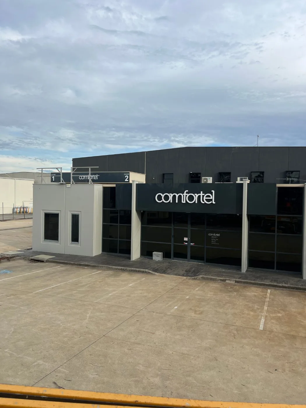 Comfortel showroom and warehouse frontage in Heatherton, painted by Jetblack Painting
