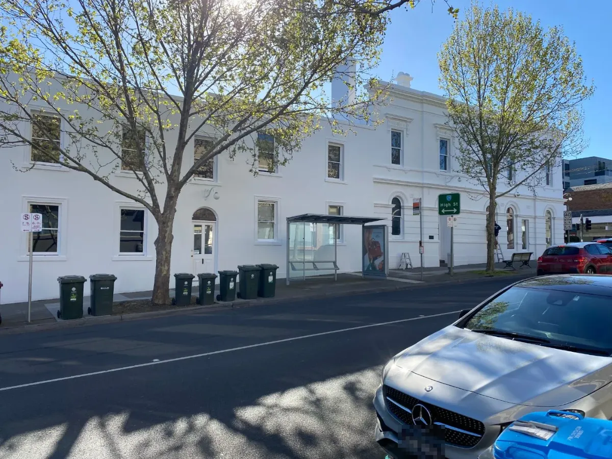 Heritage multi-storey building repainted white by Jetblack Painting for a Melbourne owners corporation