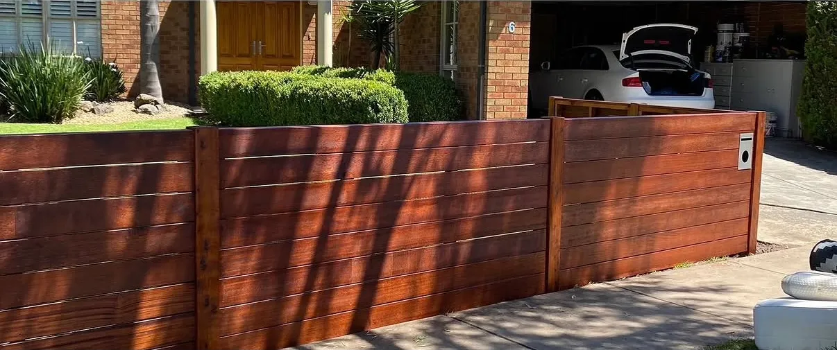 Merbau front fence finished with oil, bringing out the grain in the timber