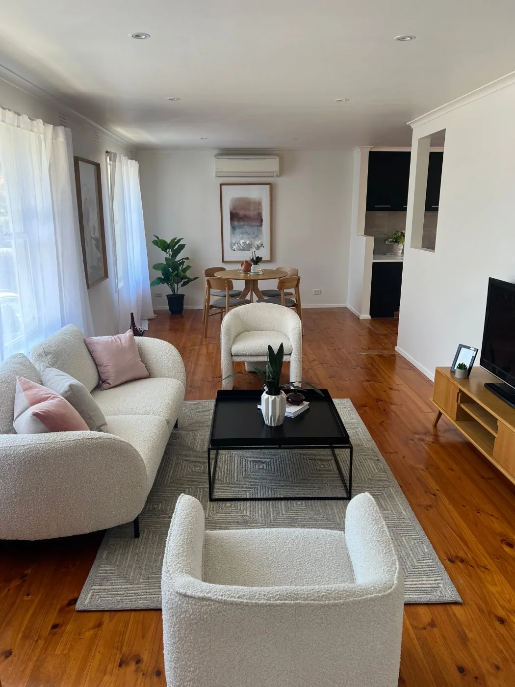 Styled living and dining room interior painted by Jetblack Painting