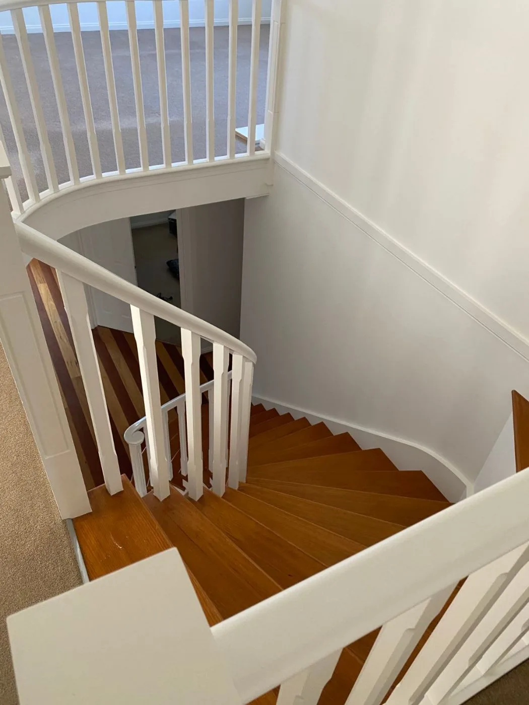 Staircase balustrade and walls painted white by Jetblack Painting
