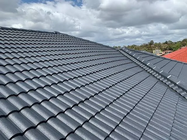 Charcoal tiled roof resprayed by Jetblack Painting in Melbourne
