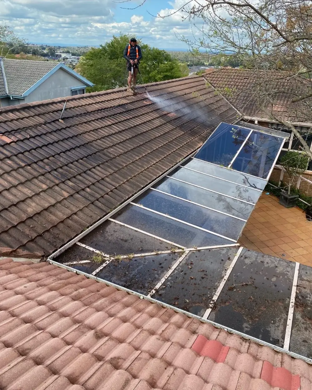 High-pressure roof cleaning and preparation by Jetblack Painting