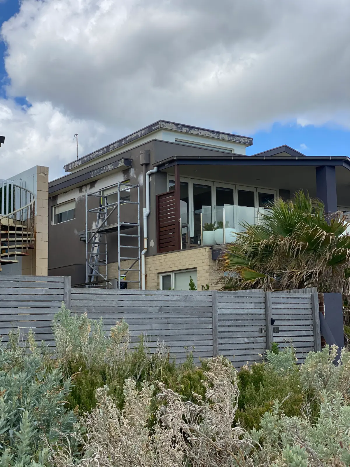 Scaffolding against the rear elevation of a beachfront Aspendale house during exterior painting