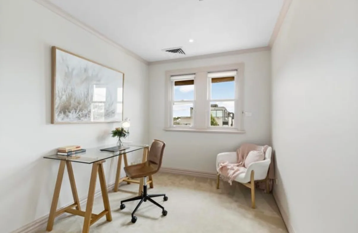 Study in a Malvern home before the pre-sale repaint, mauve cornice and window frames